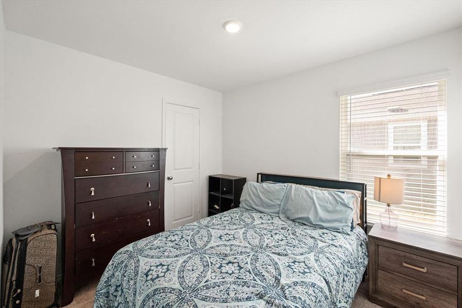 View of carpeted bedroom