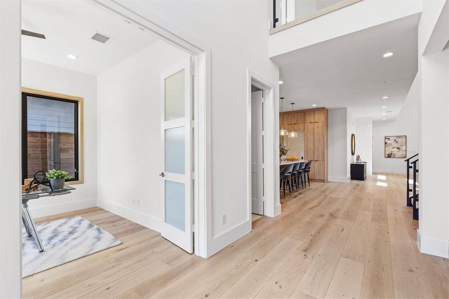 Hall featuring light hardwood / wood-style floors