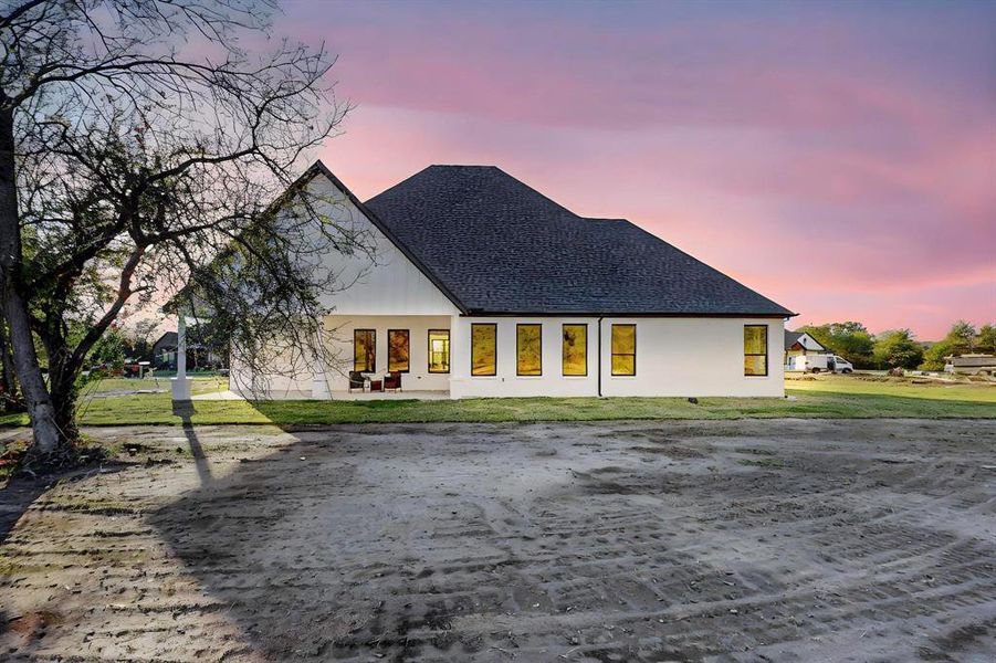 View of front of home featuring a yard