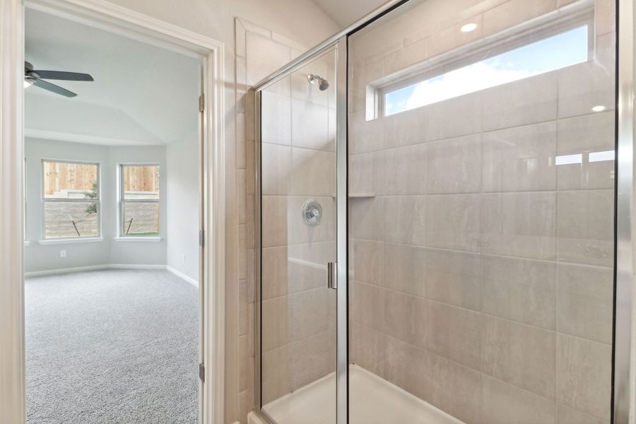 Primary suite bathroom in the Callaghan floorplan at a Meritage Homes community.