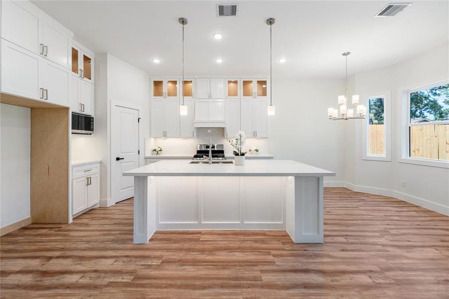 Front view of Kitchen. Notice the detailed trim on the large island