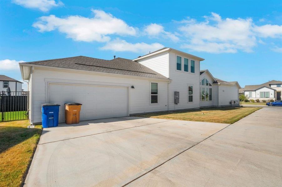 Two and a half car garage. One tandem spot to fit a golf cart or more storage.