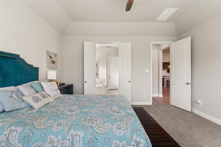 Luxurious Master Suite with Soaring Ceilings and Abundant Natural Light