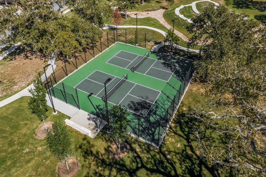 Enjoy a game of pickleball with neighbors/friends at the Pickleball Courts