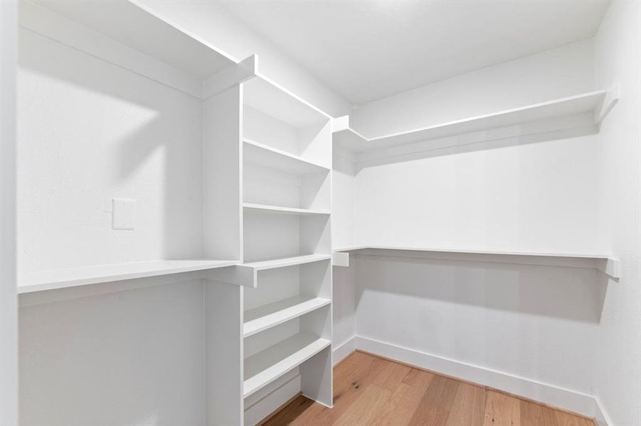 Walk in closet connects directly to the primary bath.