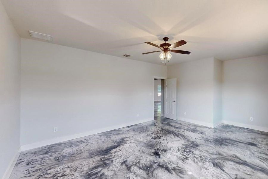 Unfurnished room with ceiling fan