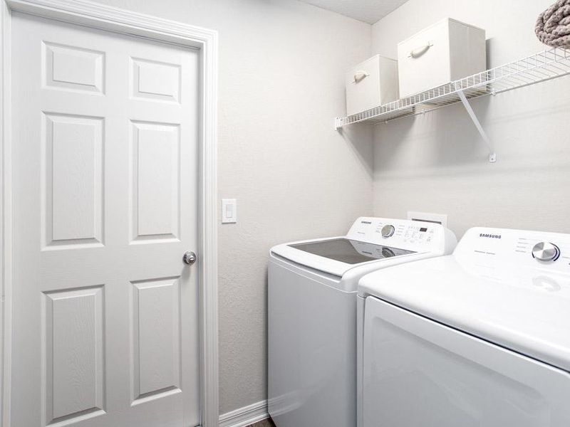 Laundry room - Begonia home plan by Highland Homes