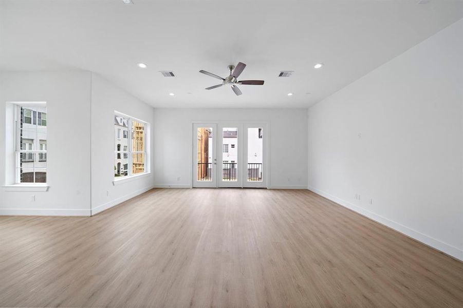 Spacious living area with huge windows