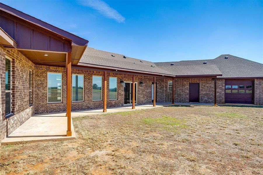 Garage door to backyard could add covered entertainment space or let the breeze blow through.