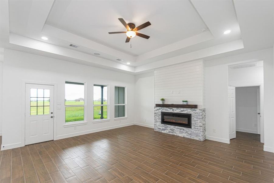 Living Area with plenty of windows for natural lighting.