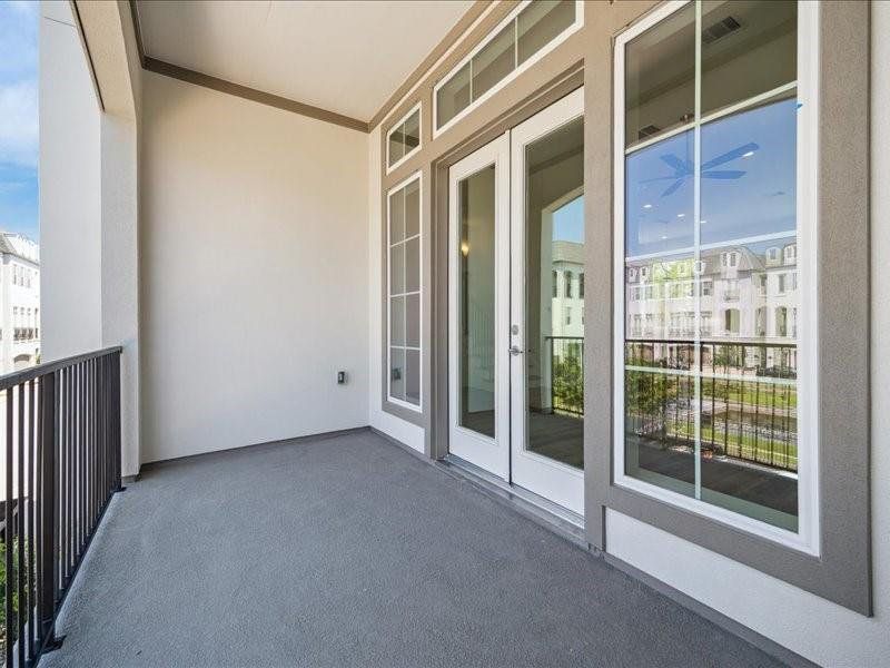 Balcony large enough for patio furniture to enjoy the stunning view