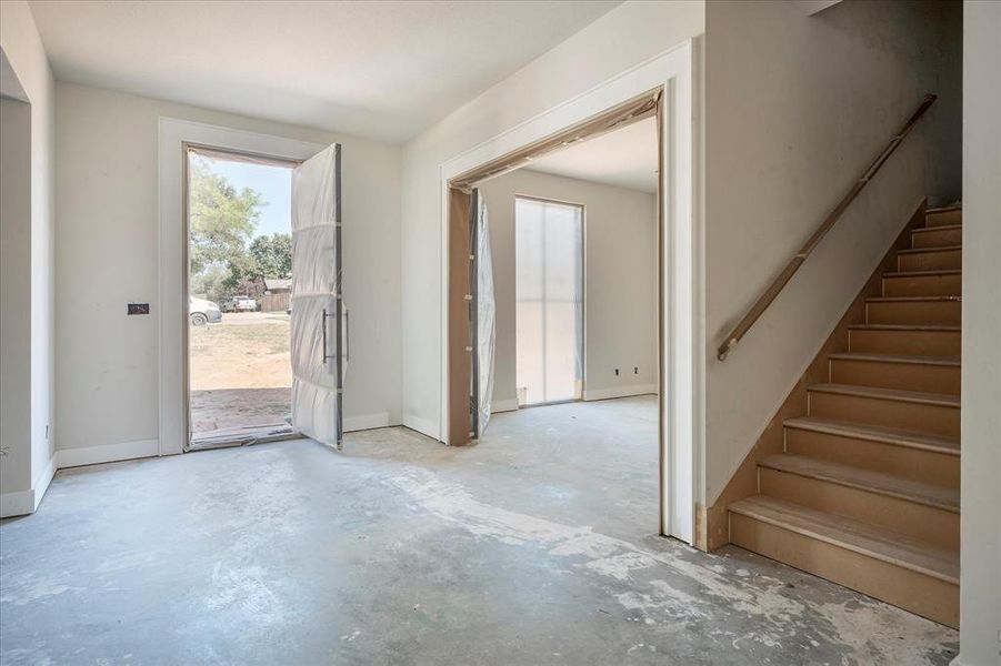 Entrance with office and Staircase to 2nd floor.