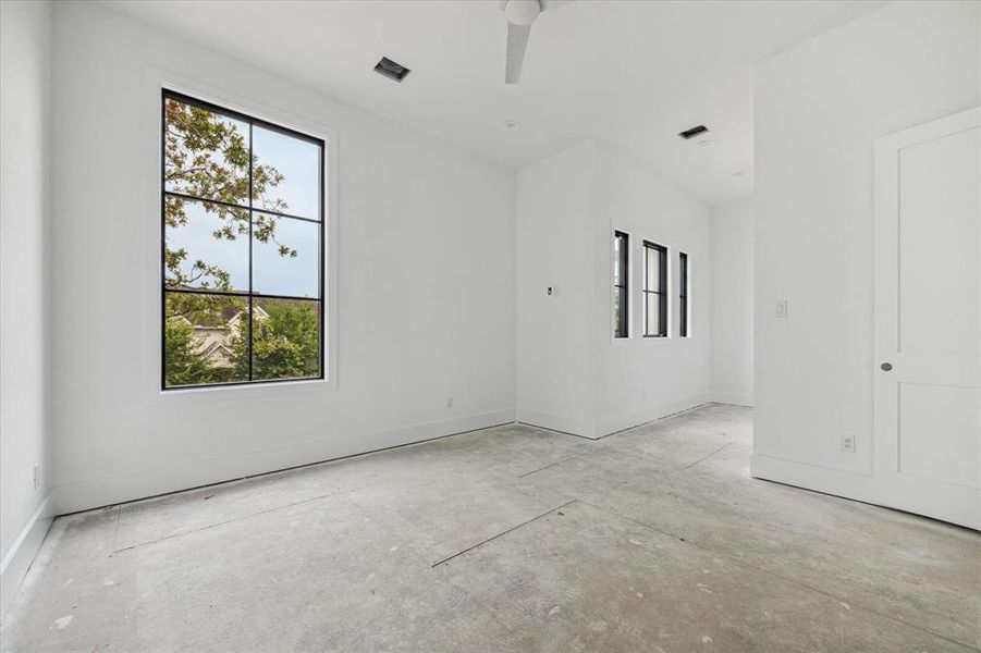 You will fall in love with this treetop secondary bedroom.  All three of the 2nd floor secondary bedrooms are complete with ensuite baths and large walk-in closets.  Photo as of 9/3/2024