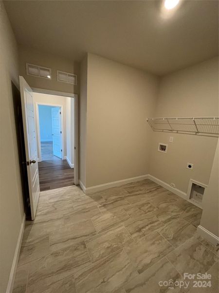 Spacious and easily accessible laundry room