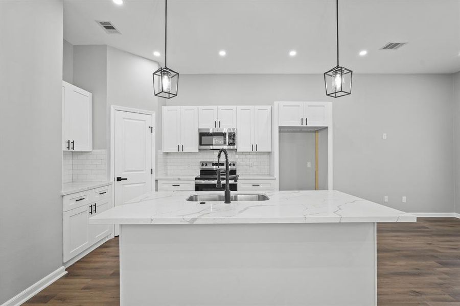 Bright kitchen with island.