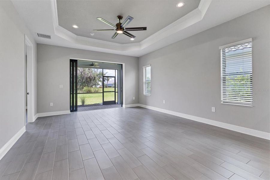 Spacious great room with custom ceiling.