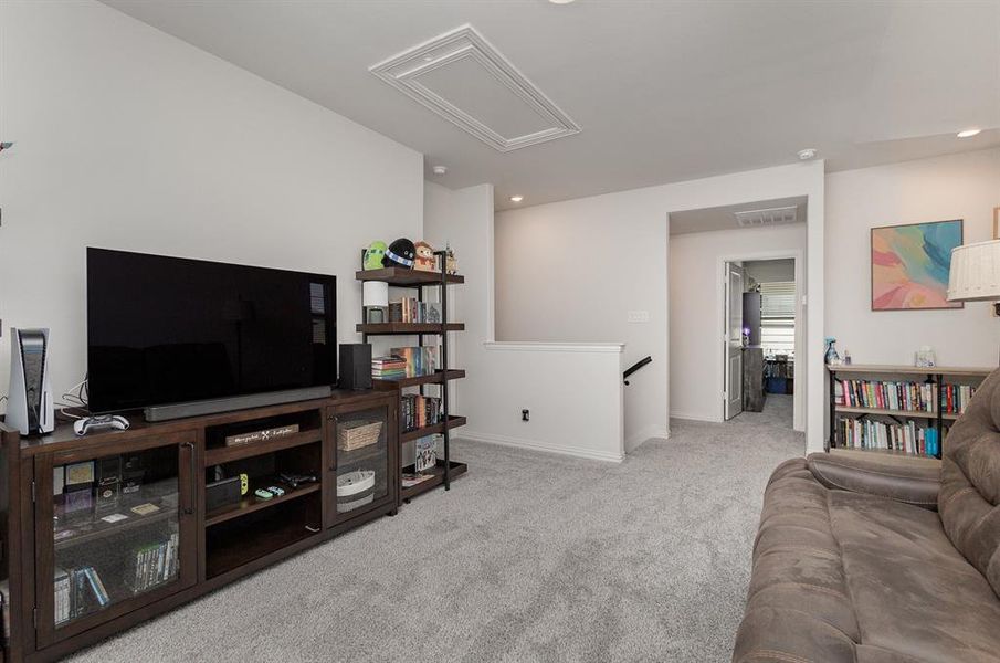 Living room with light colored carpet