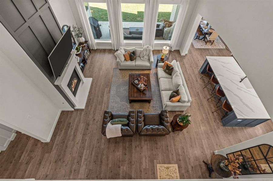 Living room with hardwood / wood-style flooring