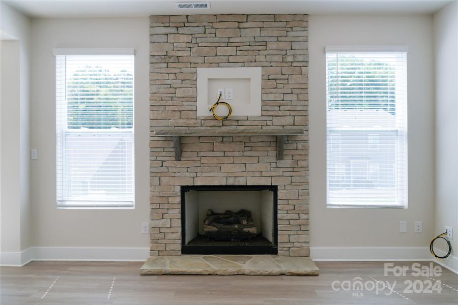 Family Room features stone fireplace