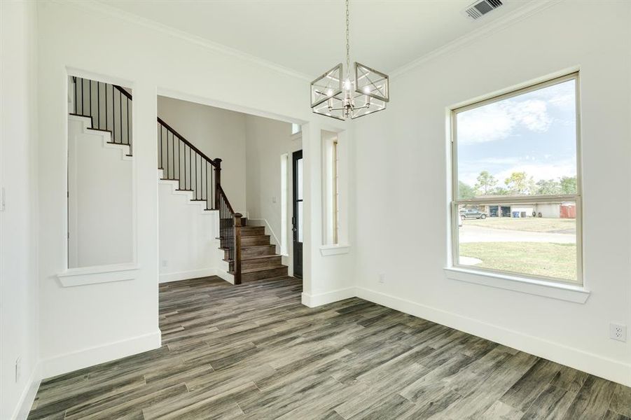 Formal dining room to the left of the entry