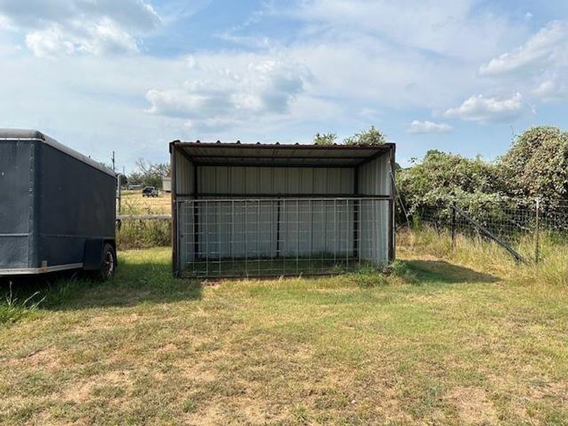 Loafing shed with gate open
