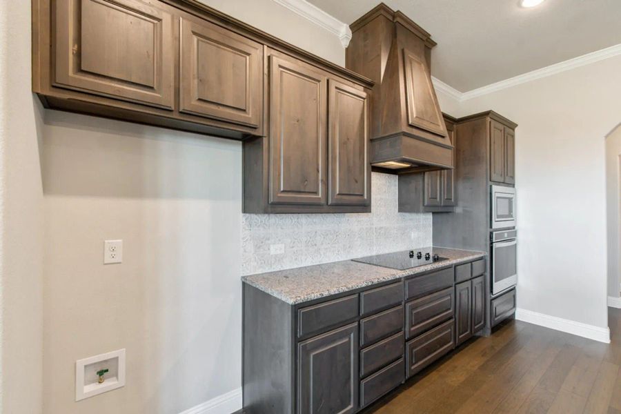 Kitchen | Concept 2555 at Massey Meadows in Midlothian, TX by Landsea Homes