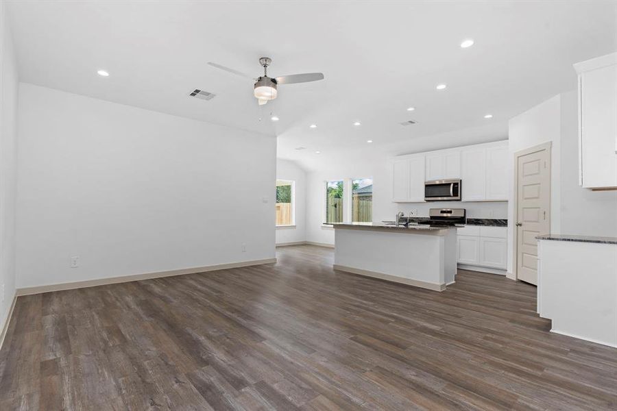 As you can see those Gorgeous Wood Like Vinyl Plank Floors will be in all the Main Living Area and even down the hallway! **Image Representative of Plan Only and May Vary as Built**