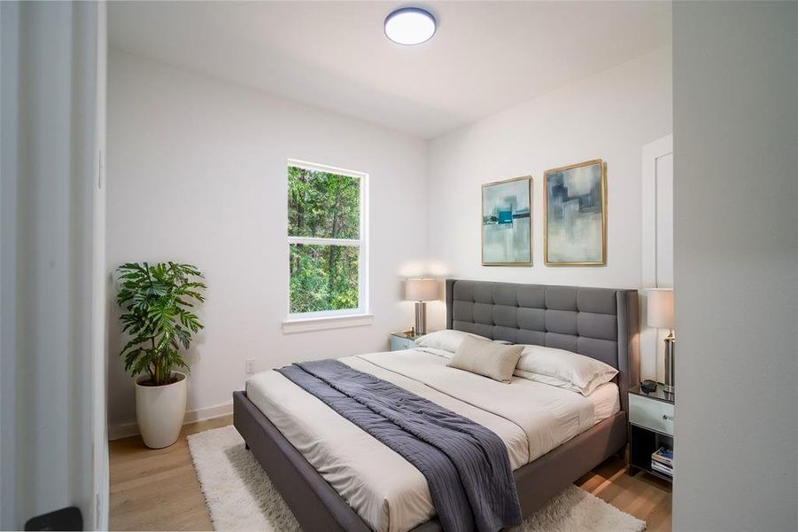 Bedroom featuring light hardwood / wood-style floors