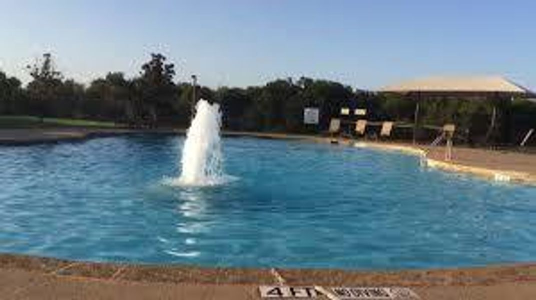 View of pool featuring a water view