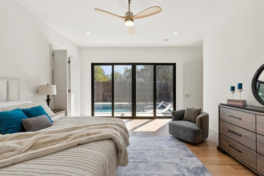 Bedroom featuring ceiling fan, light wood-type flooring, and access to exterior