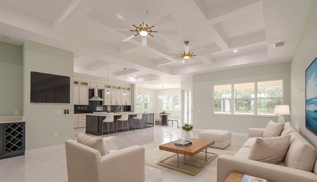 Virtually Staged - Living Room with view of the kitchen and dinette