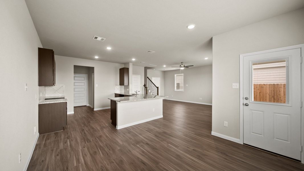 Dining Area to Kitchen and Family Room