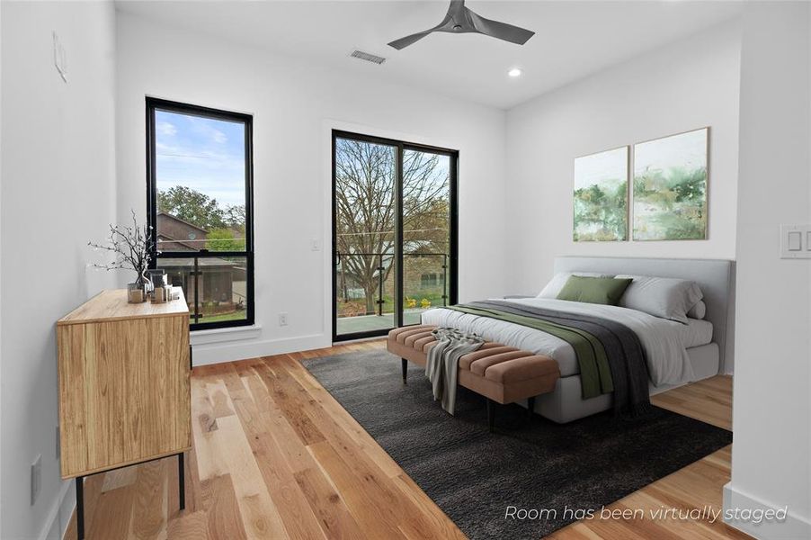 Bedroom featuring light wood-type flooring, access to outside, and ceiling fan