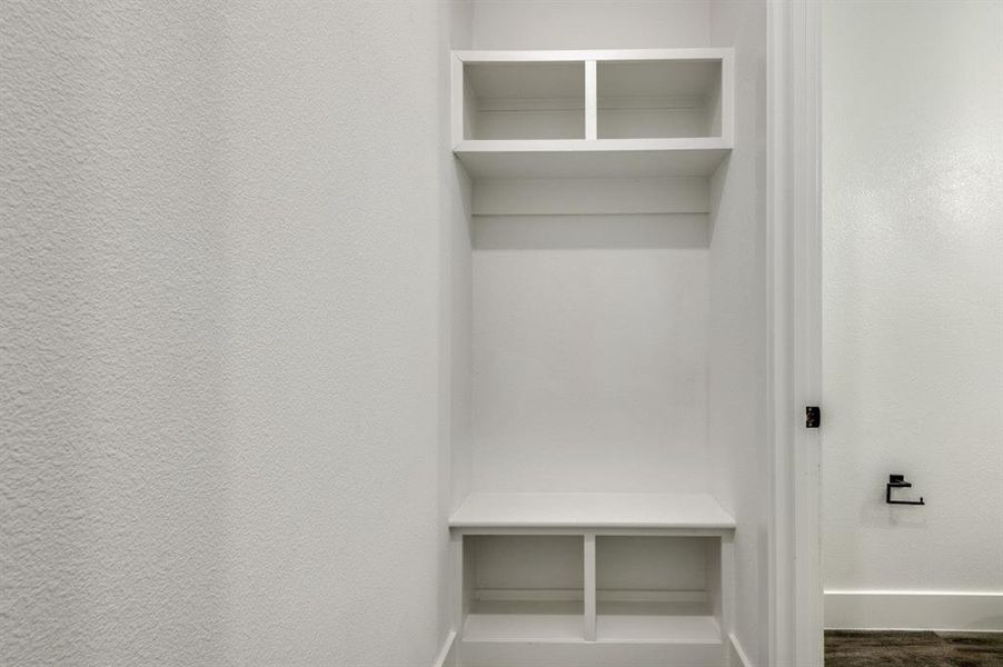 Mudroom featuring dark hardwood / wood-style floors