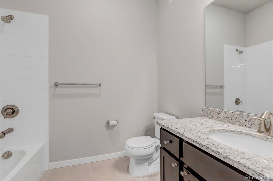 Secondary/Hallway bath, Tub and shower combo, linen closet in hallway