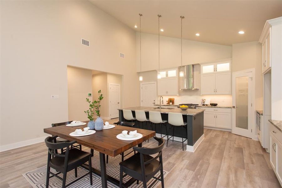 Open living, dining and kitchen layout