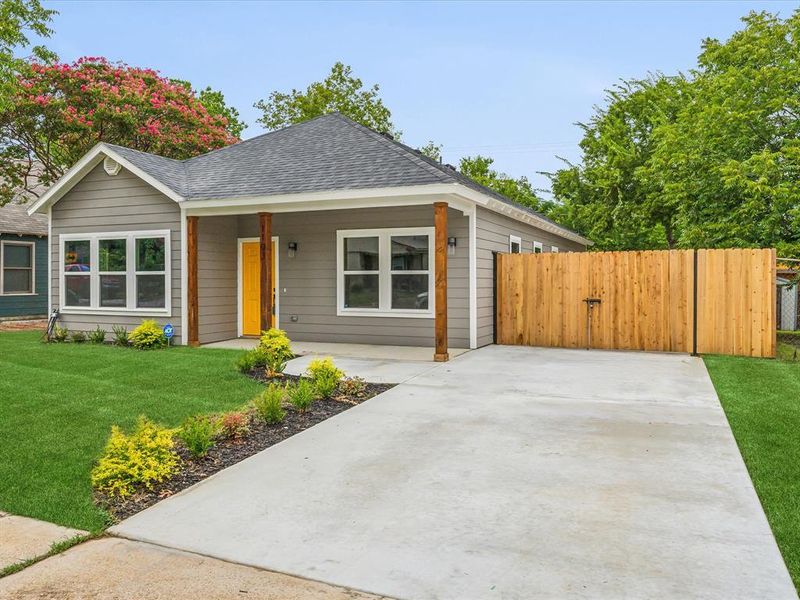 Ranch-style home with a front lawn