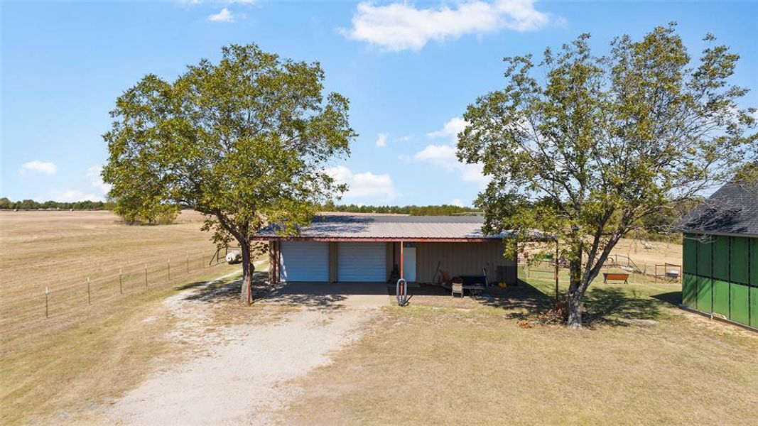 Garage featuring a rural view