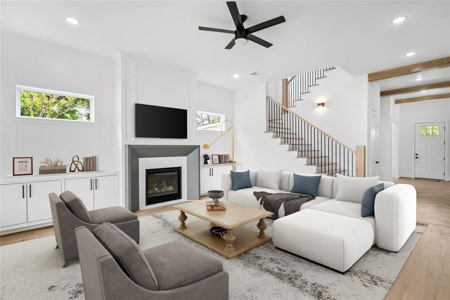 The home features beautiful engineered wood flooring throughout and sits beneath tall ceilings. You'll be impressed by the ceiling and floor detail at the entryway. *Virtual staging has been added*