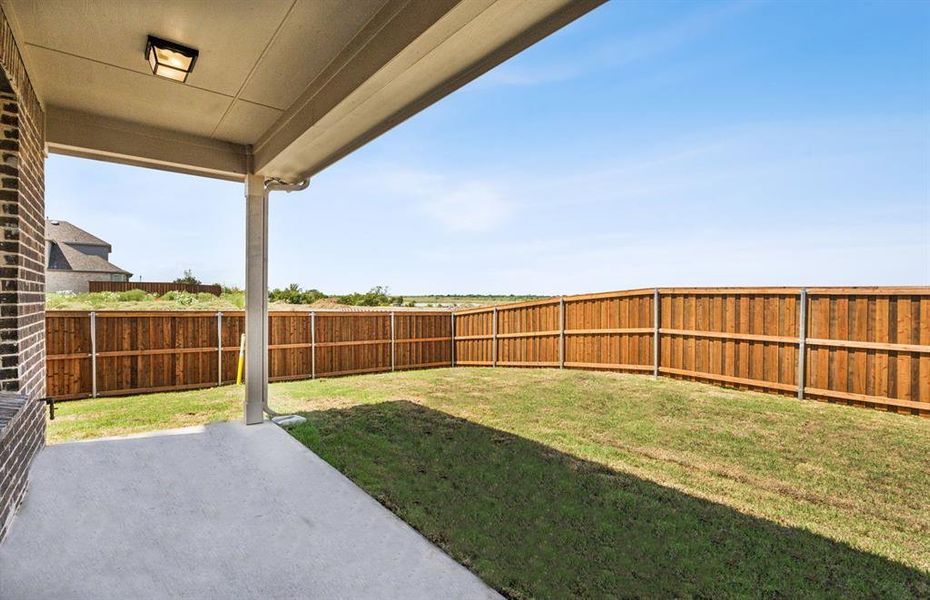 Oversized yard with covered patio