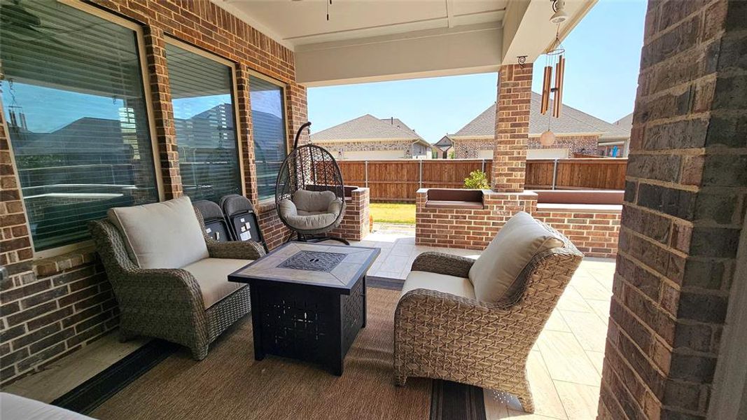 View of patio with an outdoor living space