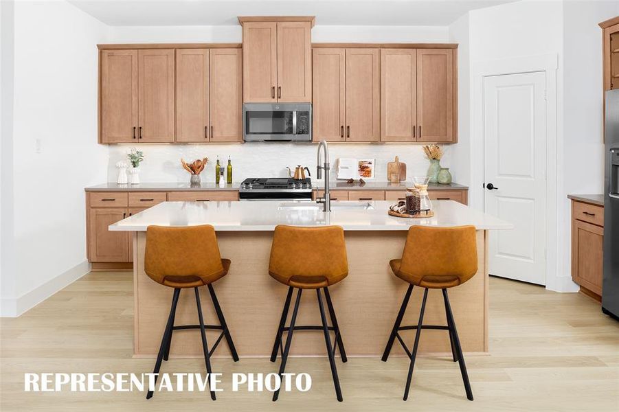 Beautiful kitchens featuring large islands are plentiful in many of our homes in Solterra!  REPRESENTATIVE PHOTO