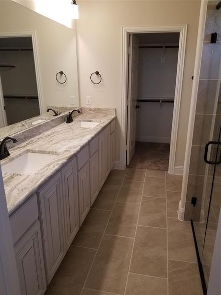 2nd Master bath with dual sinks and walk-in shower