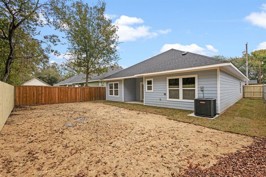 Rear view of property with a patio area and central AC unit