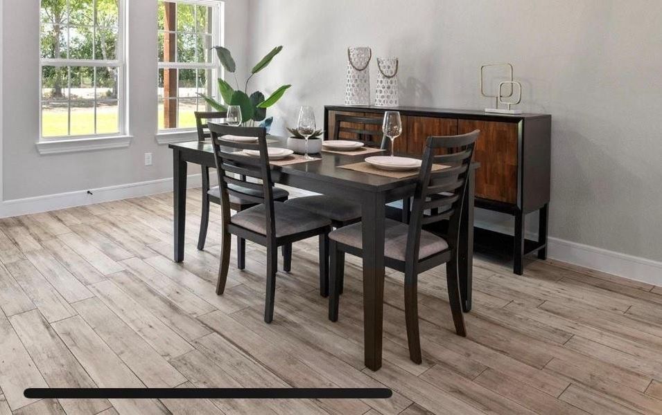 Dining area featuring light hardwood / wood-style flooring