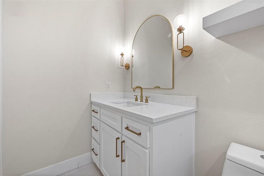 White cabinets in primary bathroom