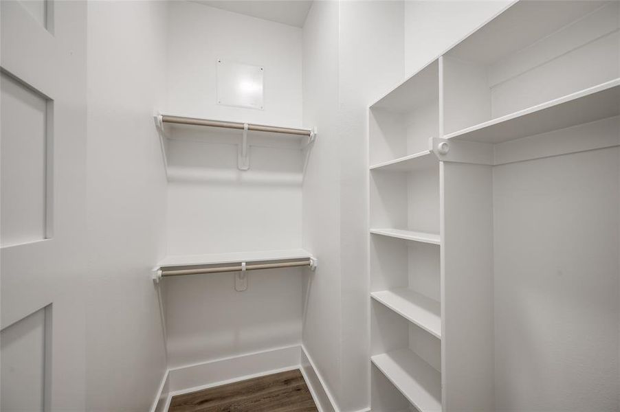 One of two walk-in closets in the Primary suite.