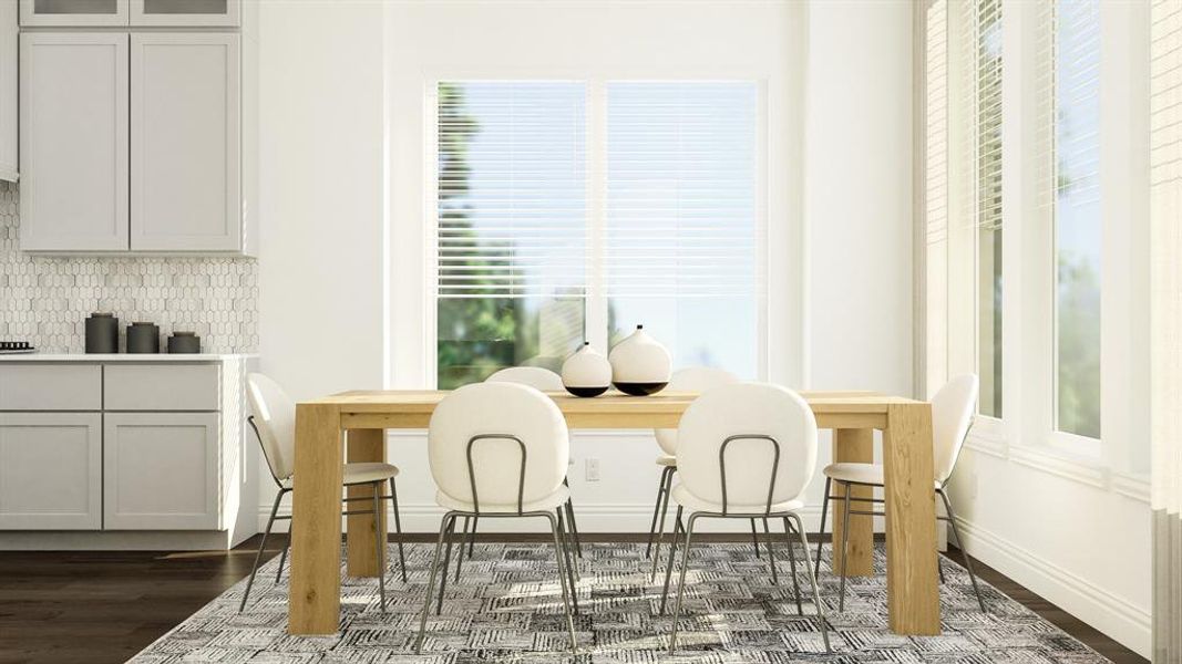 Dining area with dark hardwood / wood-style flooring