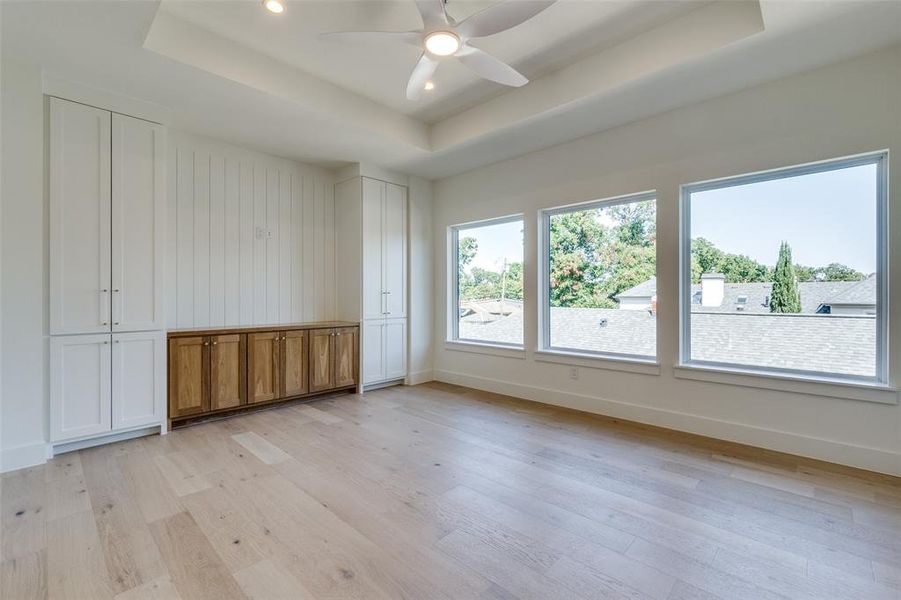 spacious game room with natural light