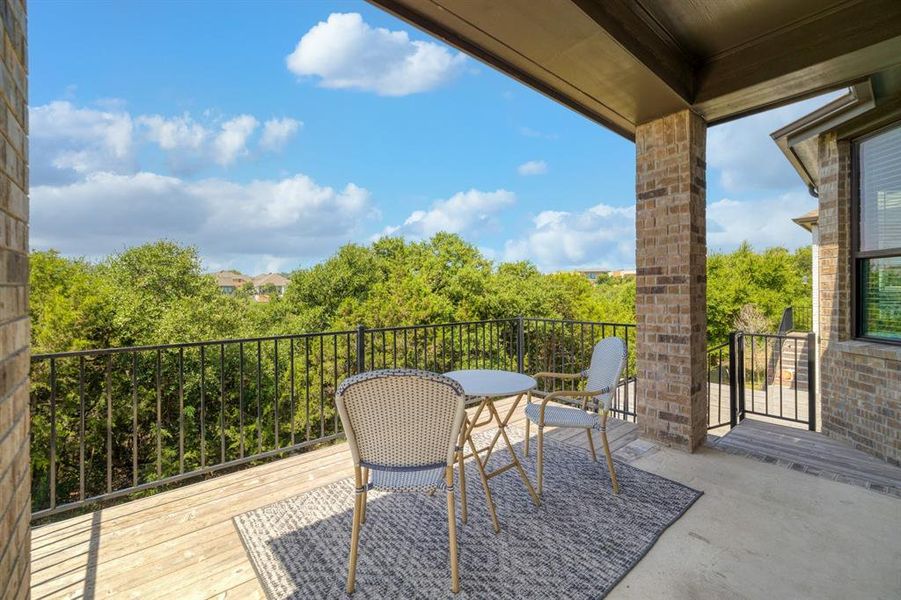 Step out of the kitchen and into this Hillcountry treetop view.